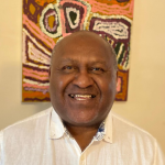 a headshot of John Harding