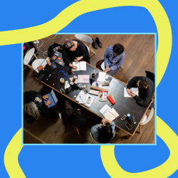 Play Summit Write Together A photo of a table of people working together